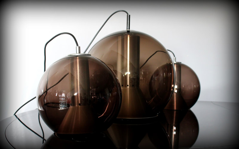 Set vintage Raak Globe design hanglampen Frank Ligtelijn